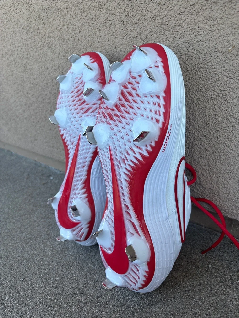 Nike White and Red Softball Cleats with Red Swoosh